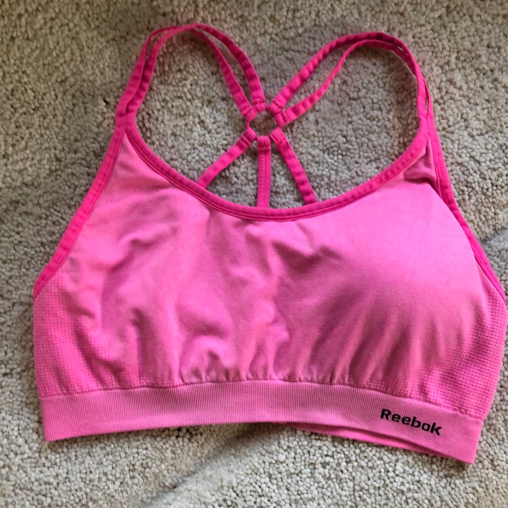 Barbiecore pink Reebok spider web race back sports bra